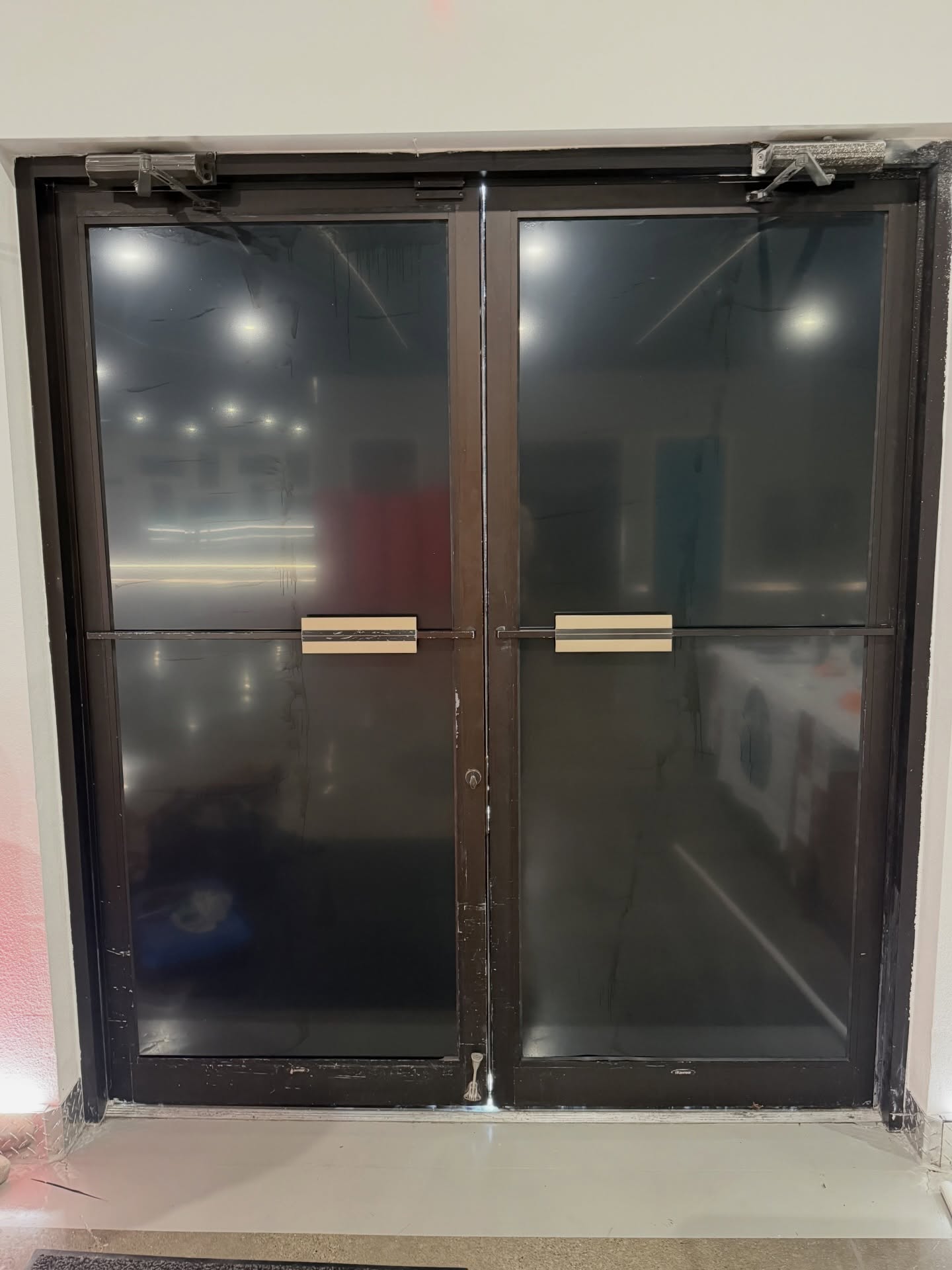 Risky Fitness blacked out windows